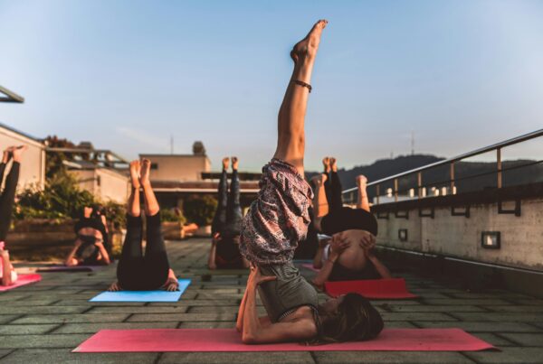 people-practicing-yoga-as-a-employee-benefit